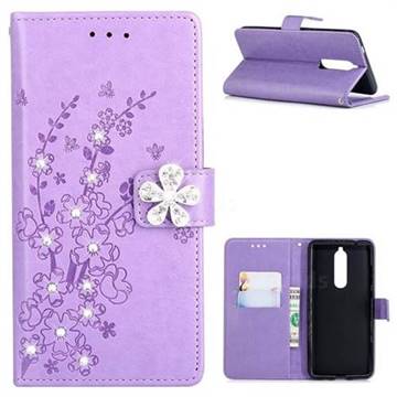 Embossing Plum Blossom Rhinestone Leather Wallet Case for Nokia 5.1 - Purple