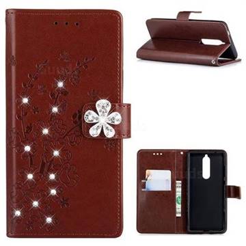 Embossing Plum Blossom Rhinestone Leather Wallet Case for Nokia 5.1 - Brown