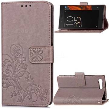 Embossing Imprint Four-Leaf Clover Leather Wallet Case for Sony Xperia X Compact - Gray